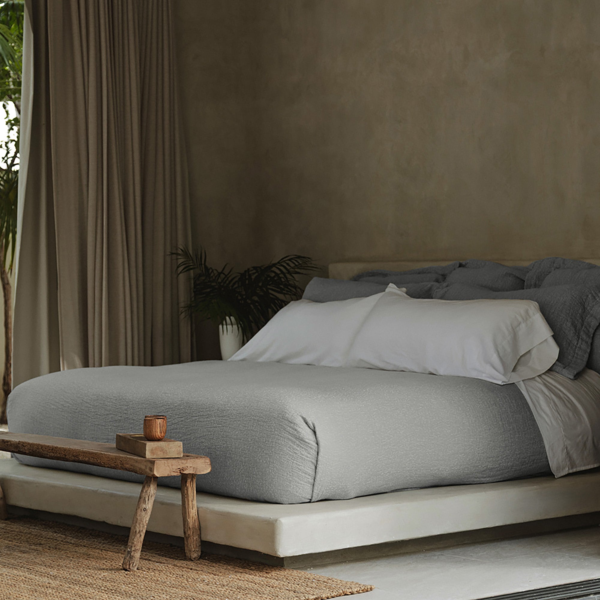Veil Euro Sham by Rest & Reset styled on a calm, minimalist bed, adding softness and depth to the bedroom
