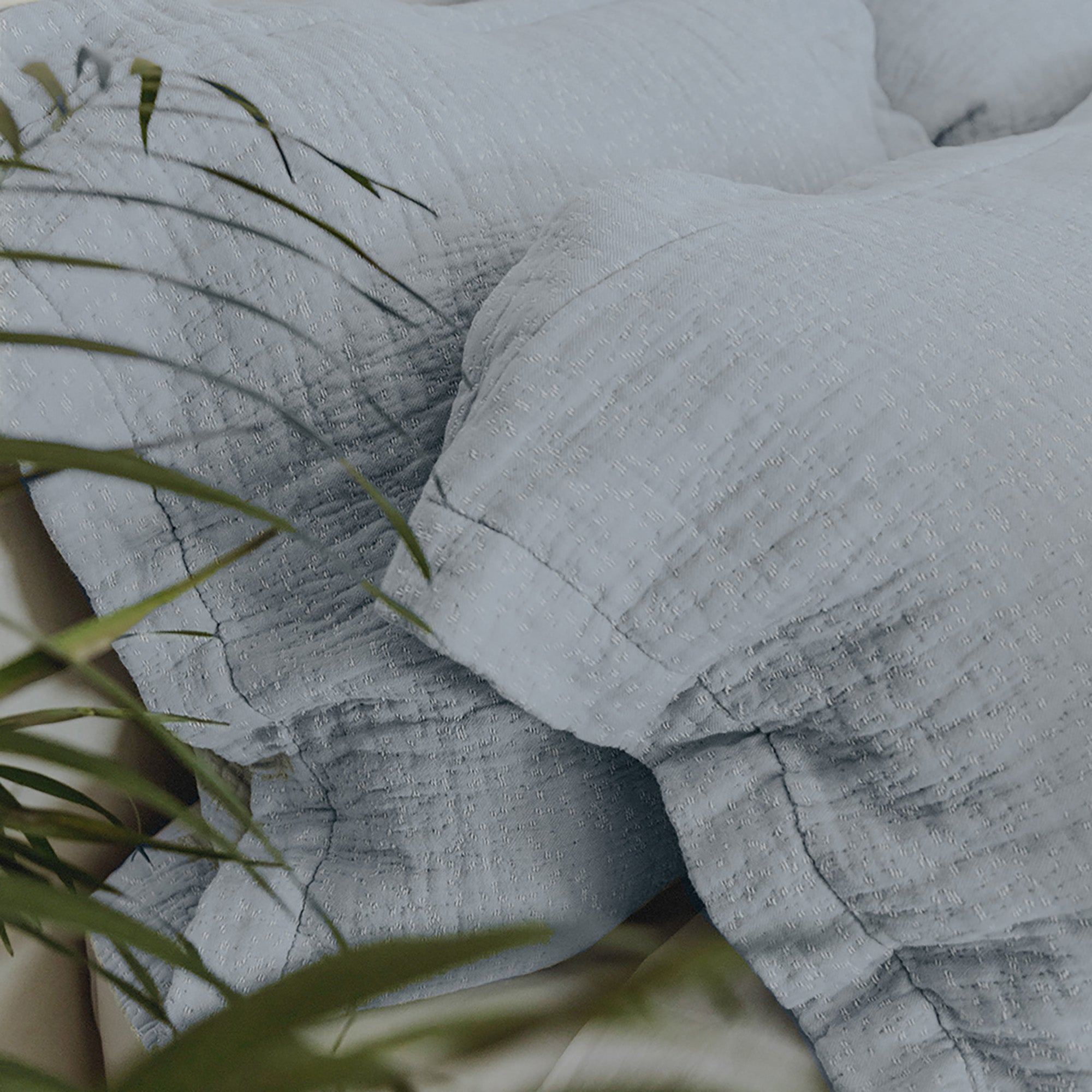 Veil Euro Sham by Rest & Reset styled in natural light, supporting a serene and mindful bedroom atmosphere