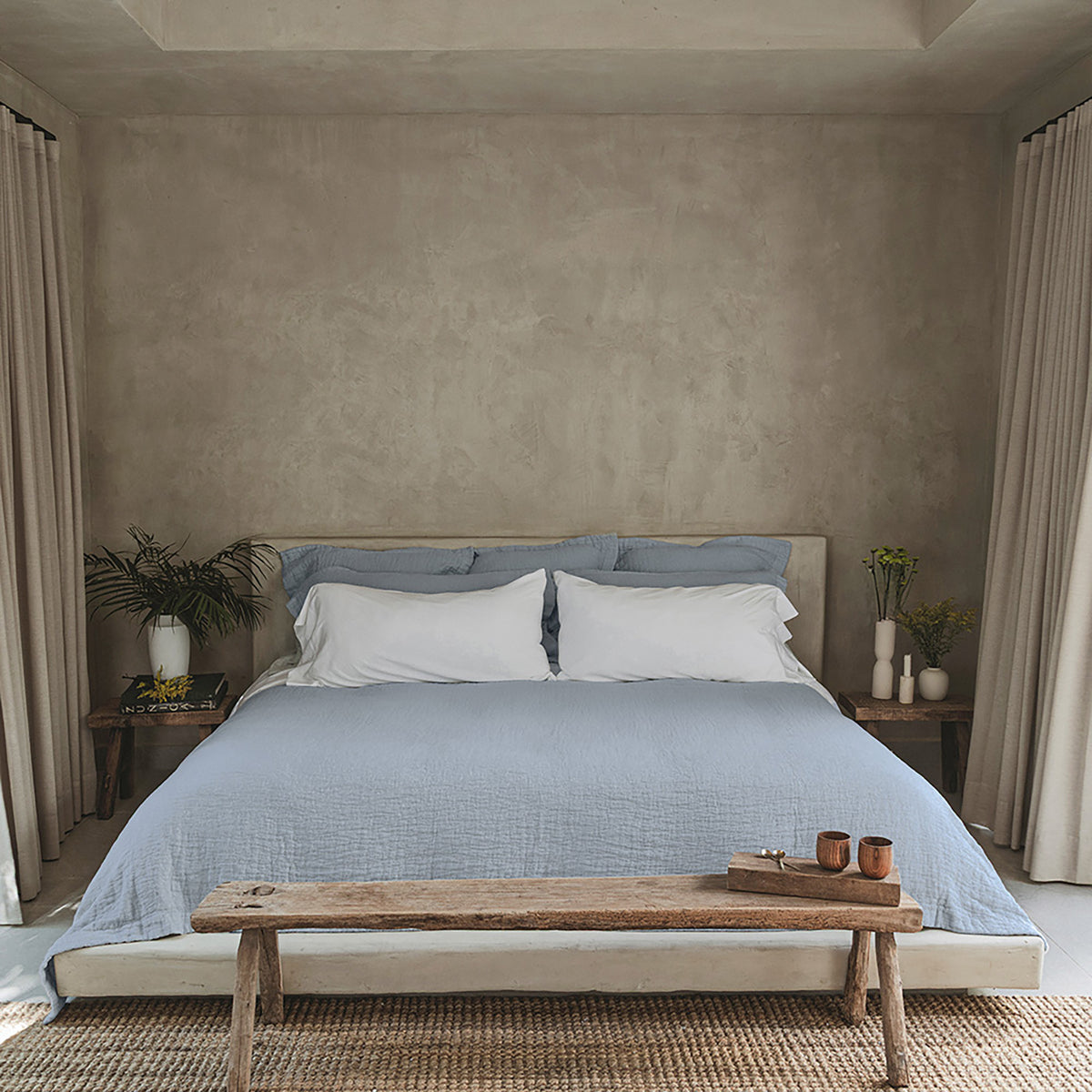 Veil Quilt by Rest & Reset layered on a made bed, designed for breathable warmth and everyday rest