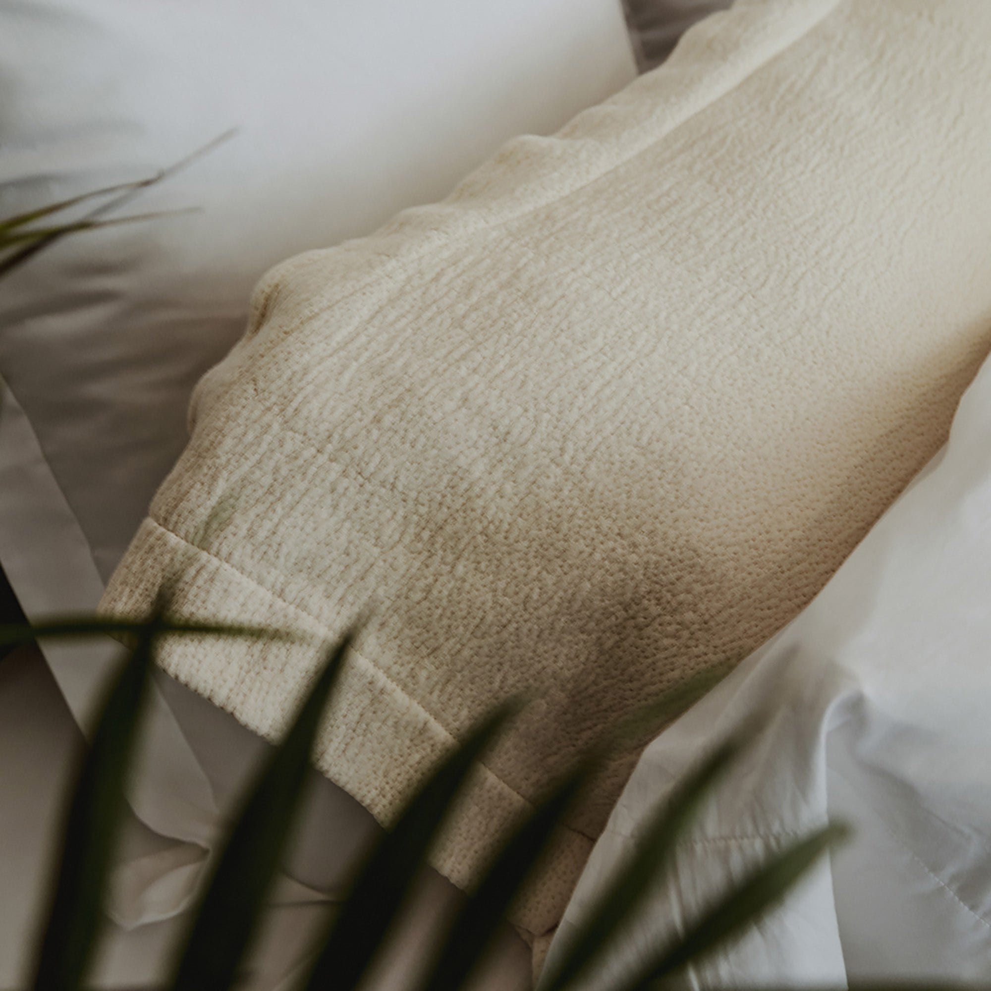 Close-up of organic cotton surface on Waves Euro Sham by Rest & Reset, emphasizing softness and relaxed structure