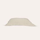 Waves Pillow Sham by Rest & Reset neatly folded, showcasing premium organic cotton and clean lines