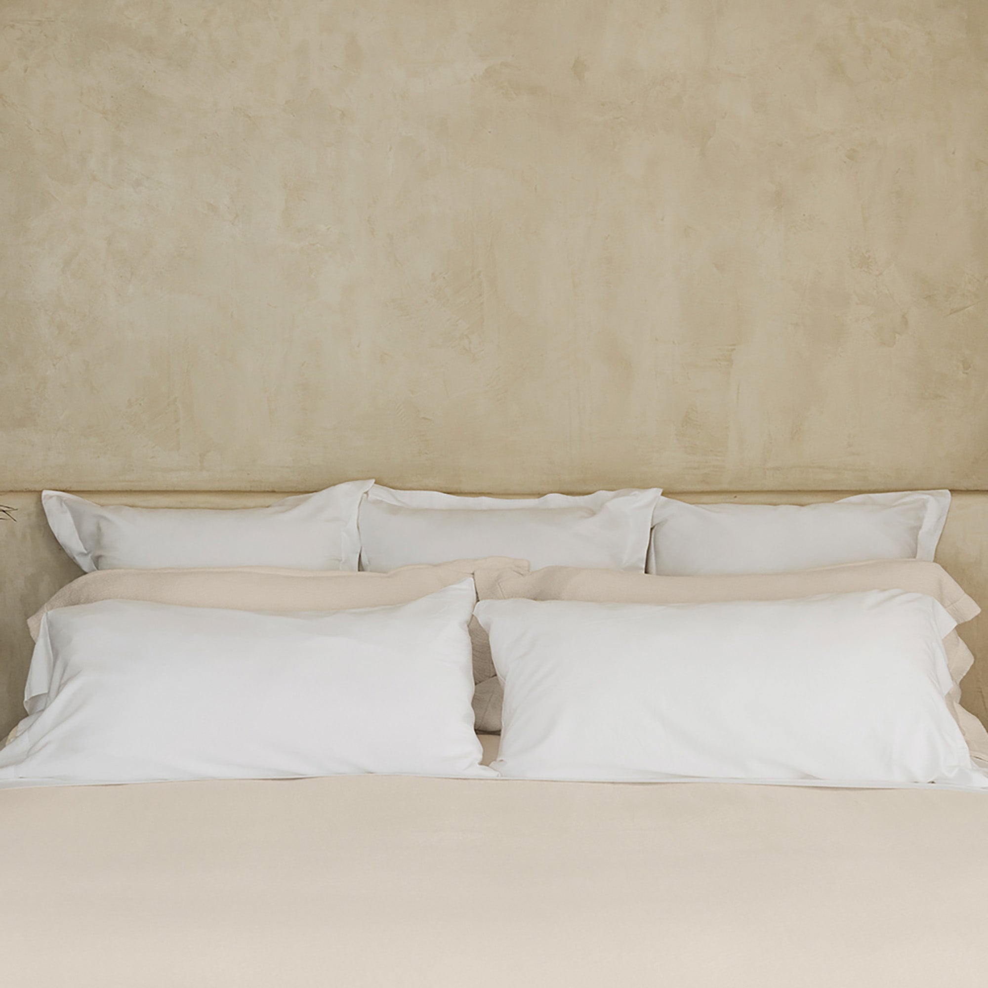 Waves Pillow Sham by Rest & Reset styled across a full bed, supporting a cohesive and restful bedding aesthetic