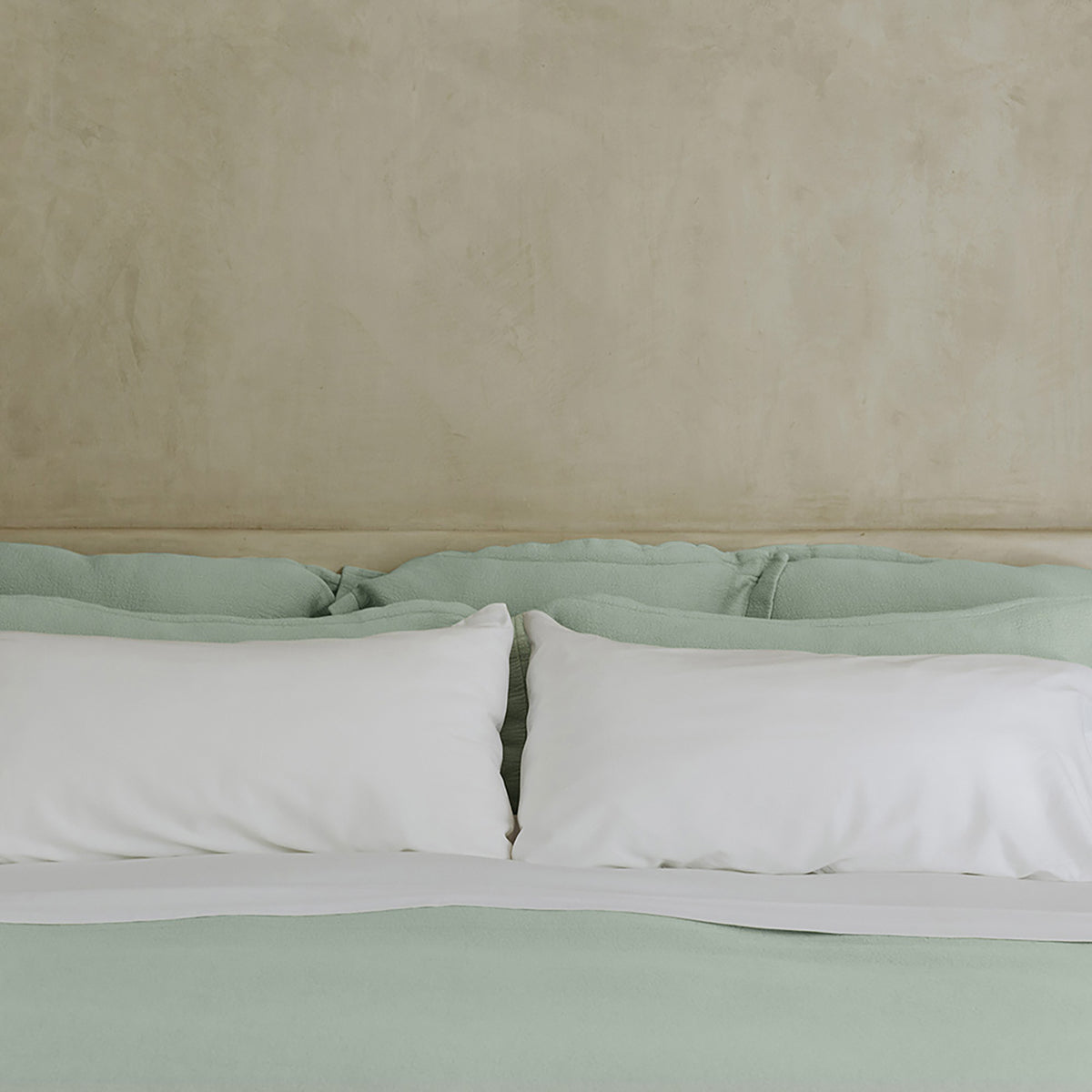 Waves Pillow Sham by Rest & Reset styled in natural light, highlighting texture and soothing color tones