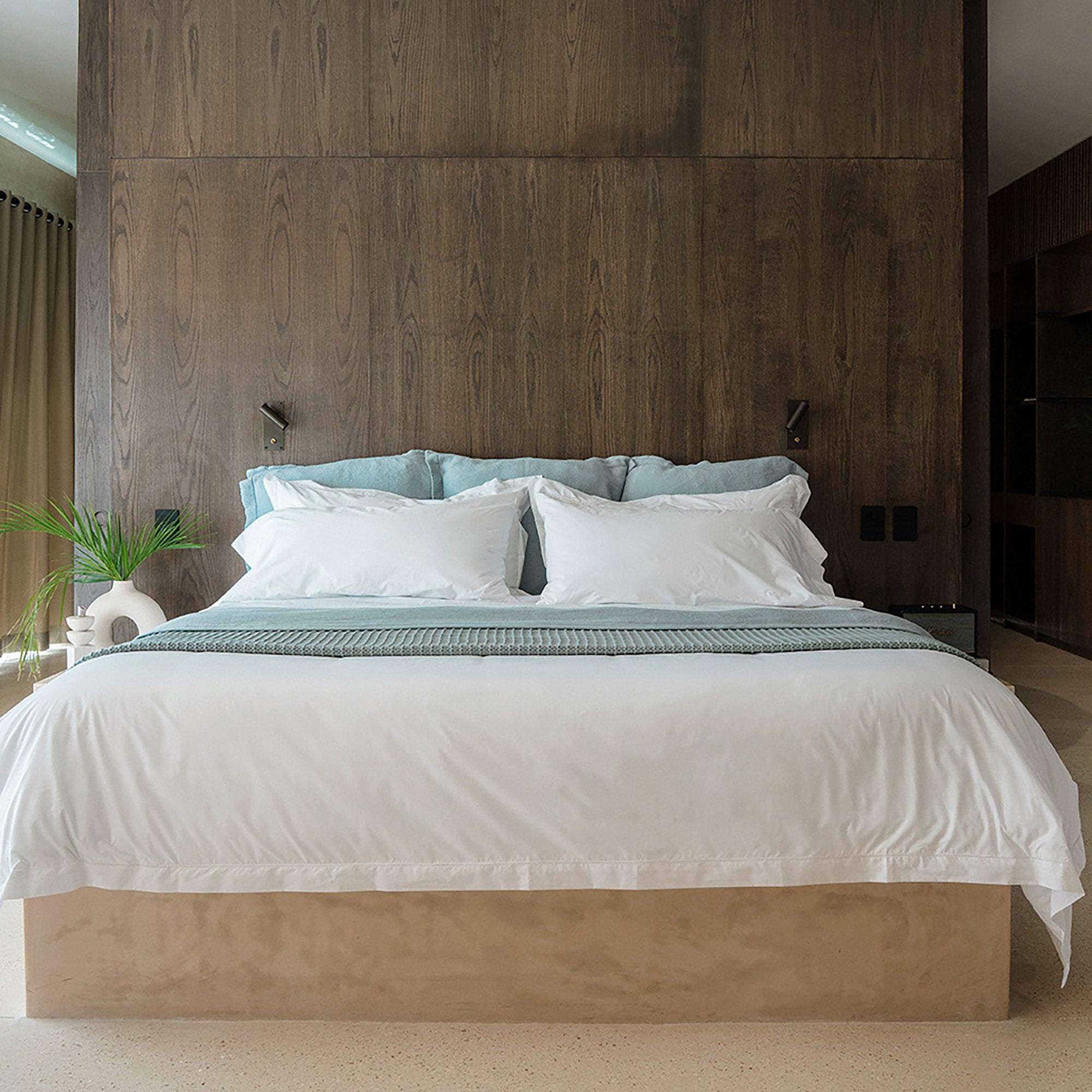 Waves Pillow Sham by Rest & Reset styled on a minimalist bed, adding texture and calm to the sleep space
