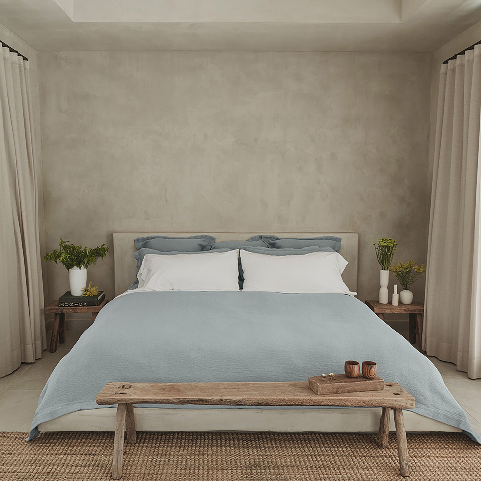 Luxury bedroom featuring Waves Quilt in organic cotton bedding by Rest &amp; Reset