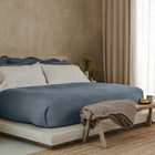 Waves Euro Sham by Rest & Reset layered with coordinating bedding, designed for softness and depth