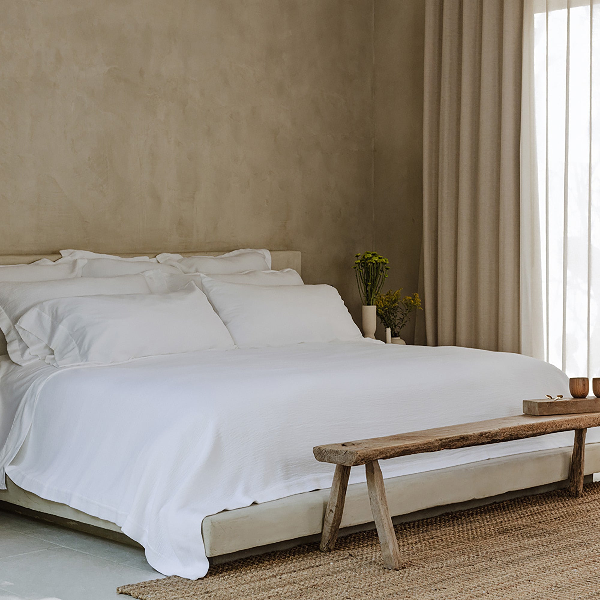 Waves Euro Sham by Rest & Reset styled as part of a complete bedding set designed for calm and restful sleep
