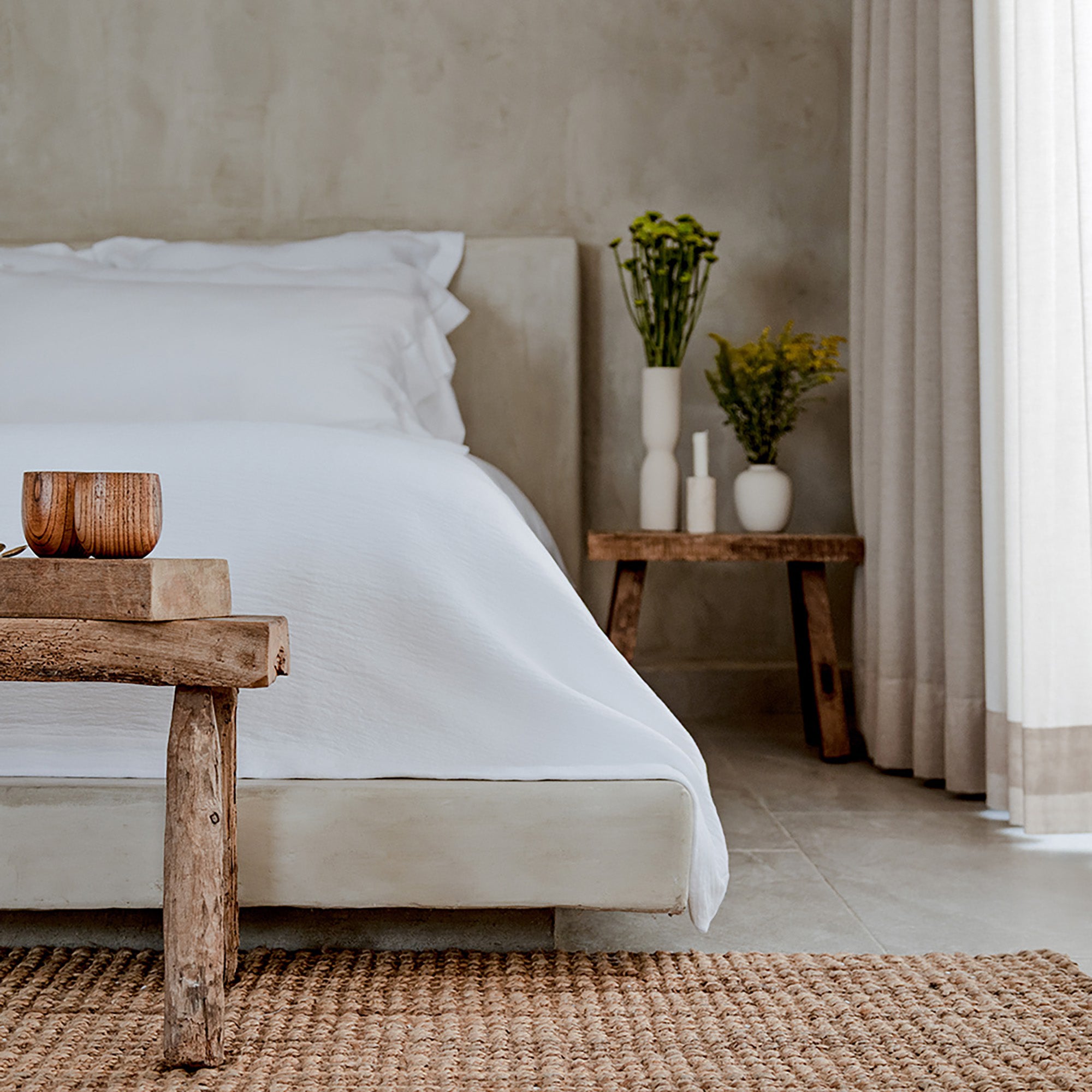 Waves Pillow Sham by Rest & Reset folded in a darker shade, highlighting organic cotton texture and thickness