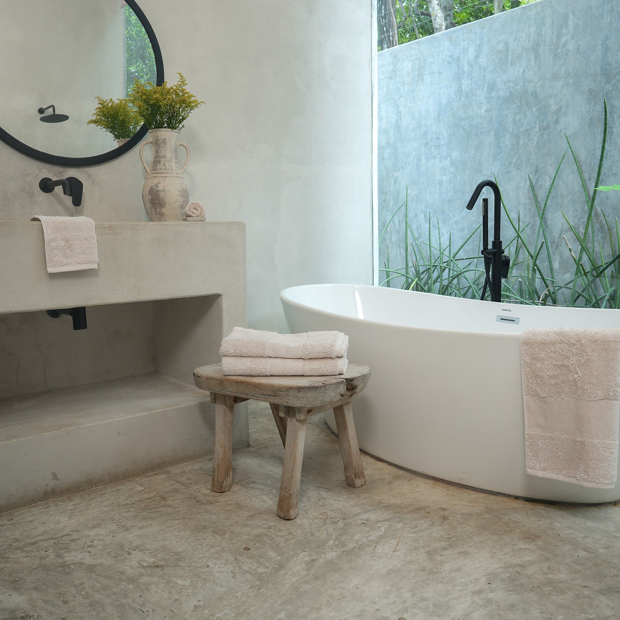 Ritual Washcloths Pair by Rest & Reset styled on a bathroom bench, adding softness and warmth to the space