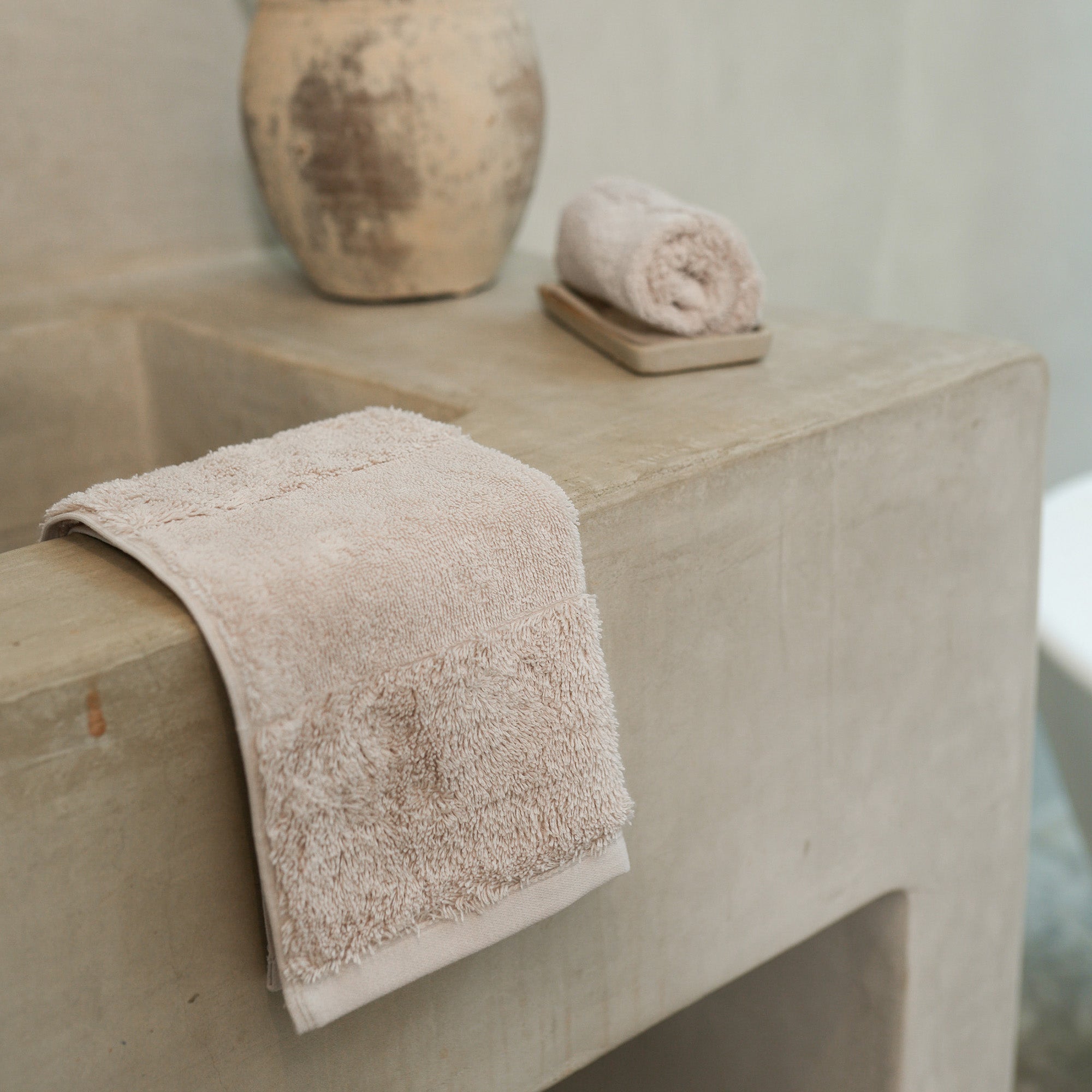 Close-up of the Ritual Washcloths Pair by Rest & Reset, highlighting organic cotton texture and refined finishing