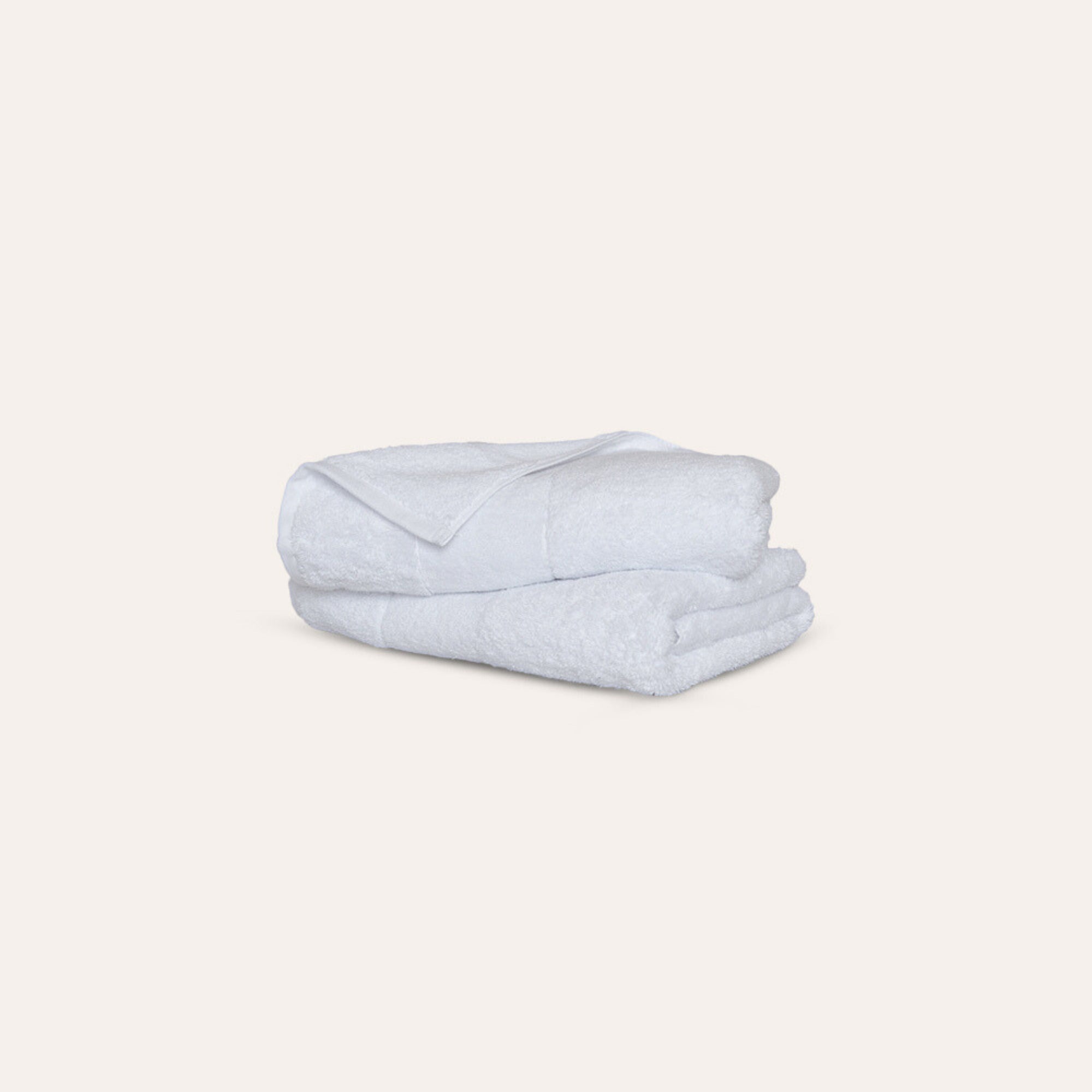 Ritual Washcloths Pair by Rest & Reset folded in a lighter shade, showcasing softness and clean finish