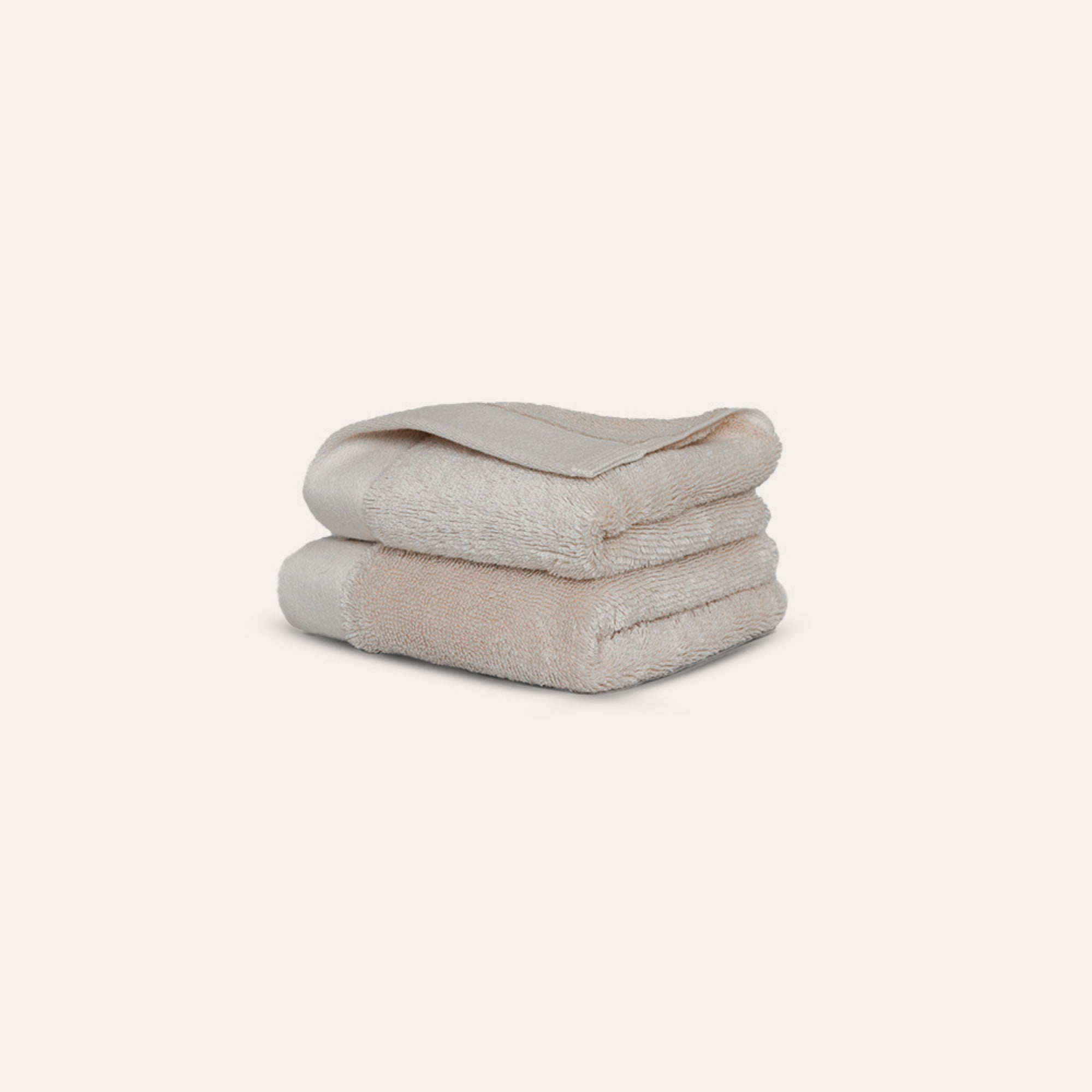 Oasis Washcloths Pair by Rest & Reset neatly folded, showcasing plush organic cotton and minimalist design