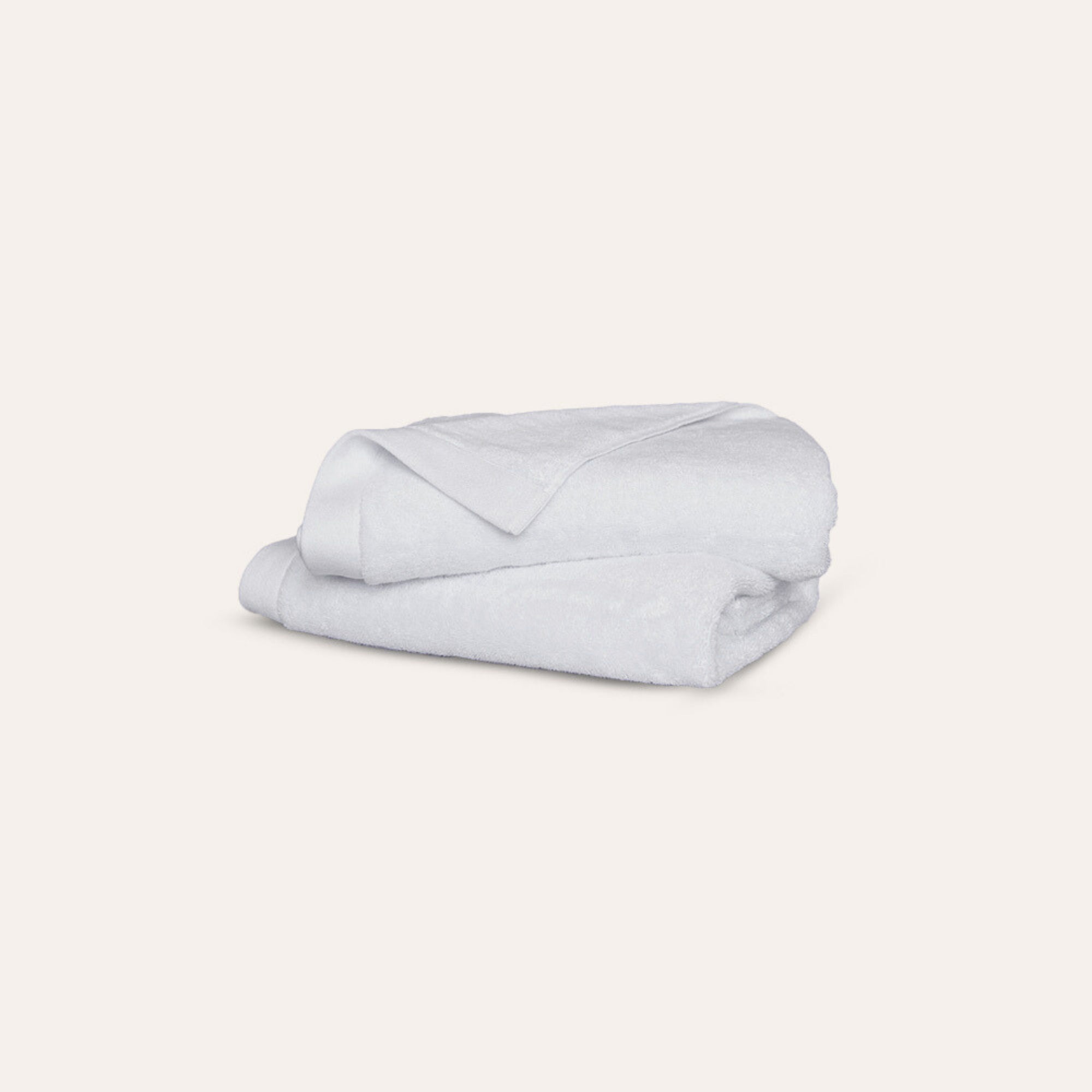 Oasis Washcloths Pair by Rest & Reset folded in a lighter shade, showcasing softness and clean finishing