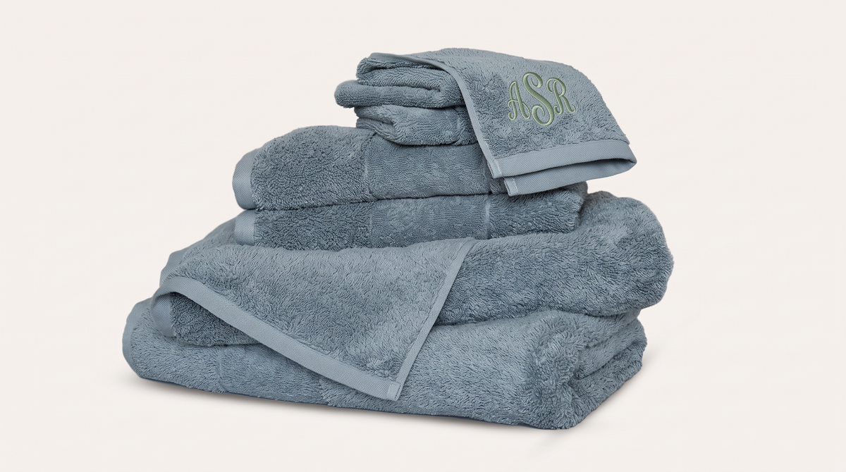 Ritual Bath Towel Set in Coast with a sage green monogram on the washcloth